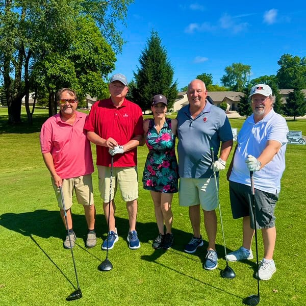 Thornton & Associates staff at community golf outing event